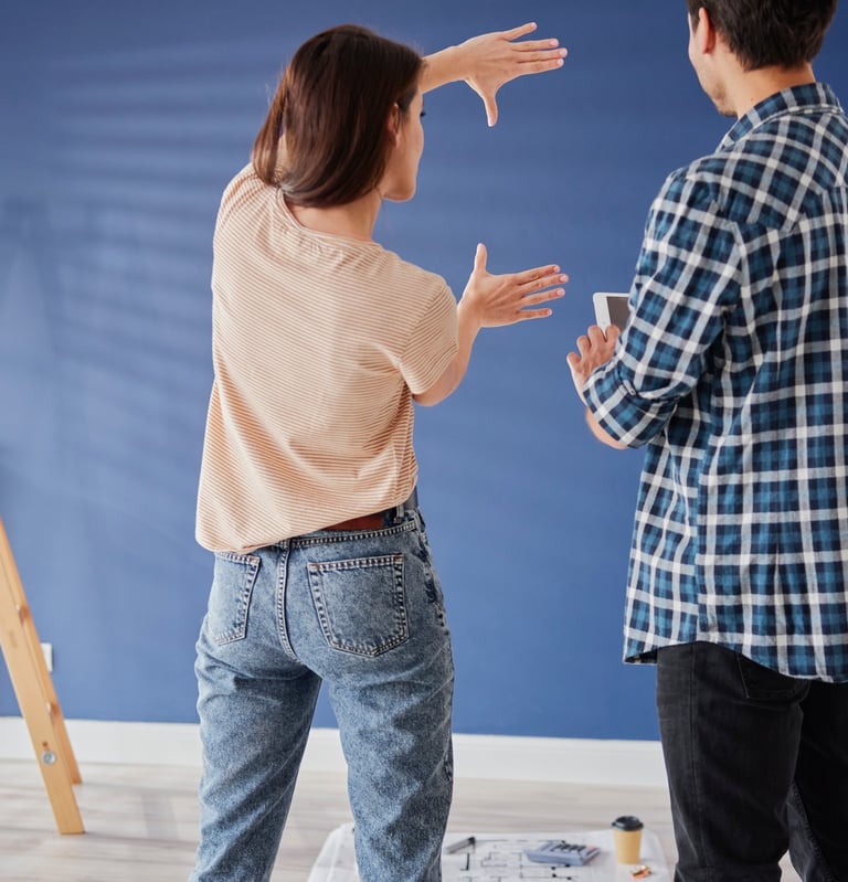 man and woman measuring something