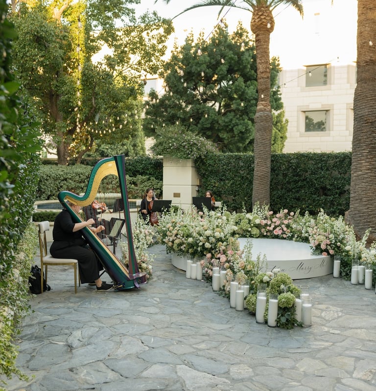 String quartet with harp performs for a luxury marriage proposal