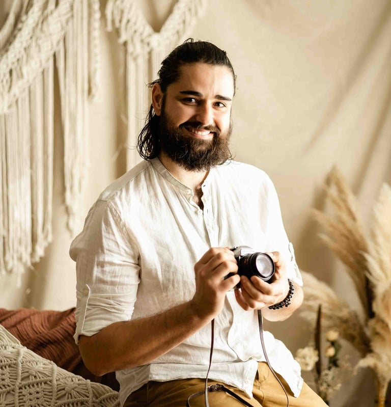 Thomas Bertini smiling with vintage film camera — BonjourMrsBride fine art wedding photographer