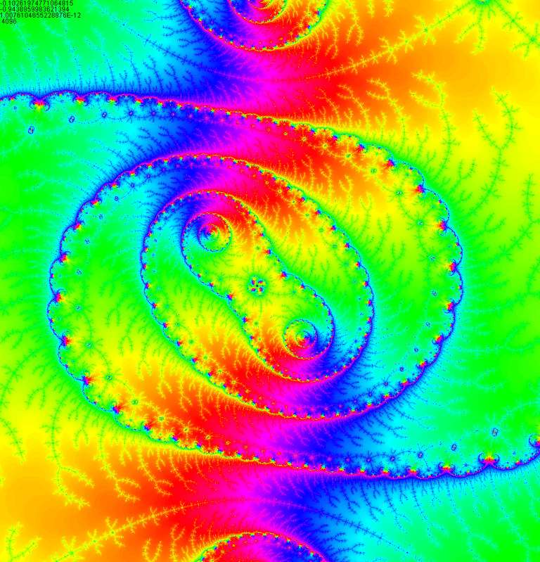 a fractal image of colorful spirals and dots of color