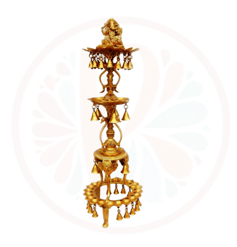 a tall brass bellows with bells and bells