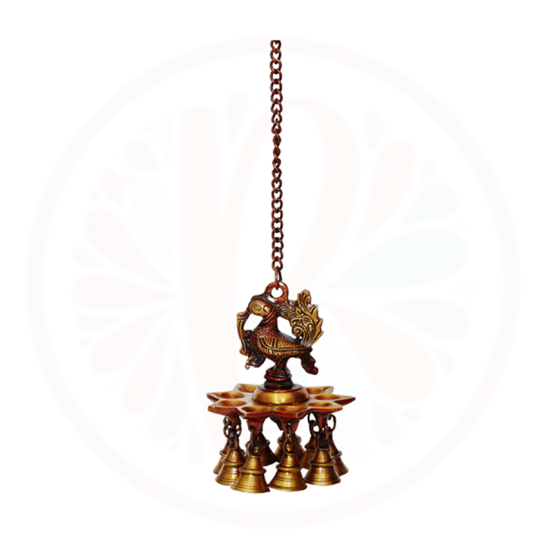 a set of three brass candlesticks with a gold colored finish