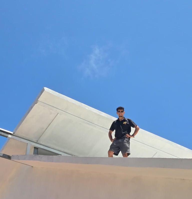 José Ponce, founder of Nance, overseeing construction work on a home roof in Samara, Guanacaste