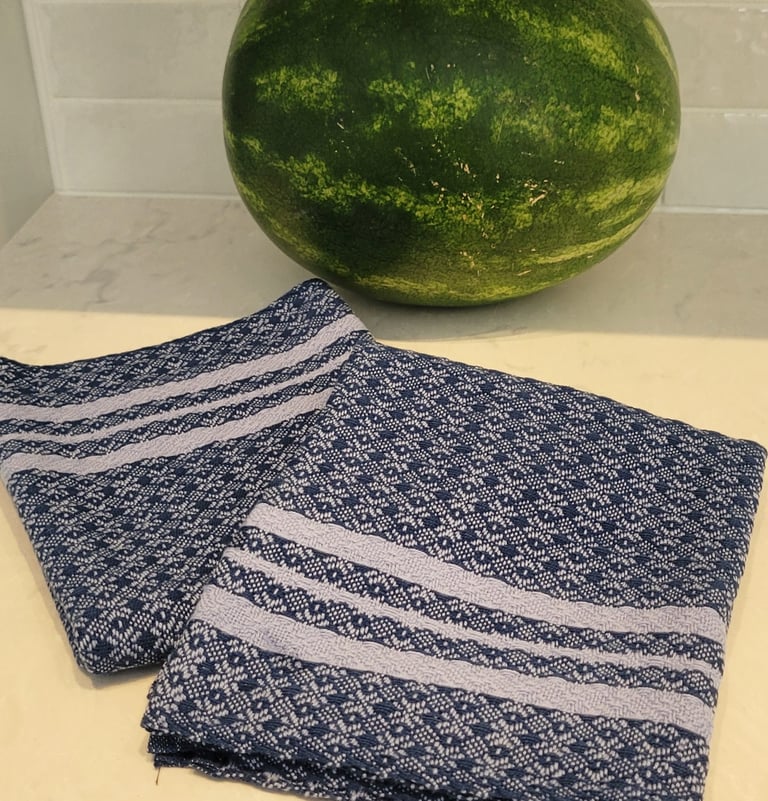 Blue and grey hand-woven towels.