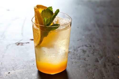 A vibrant,, and refreshing mocktail combining sweet orange juice