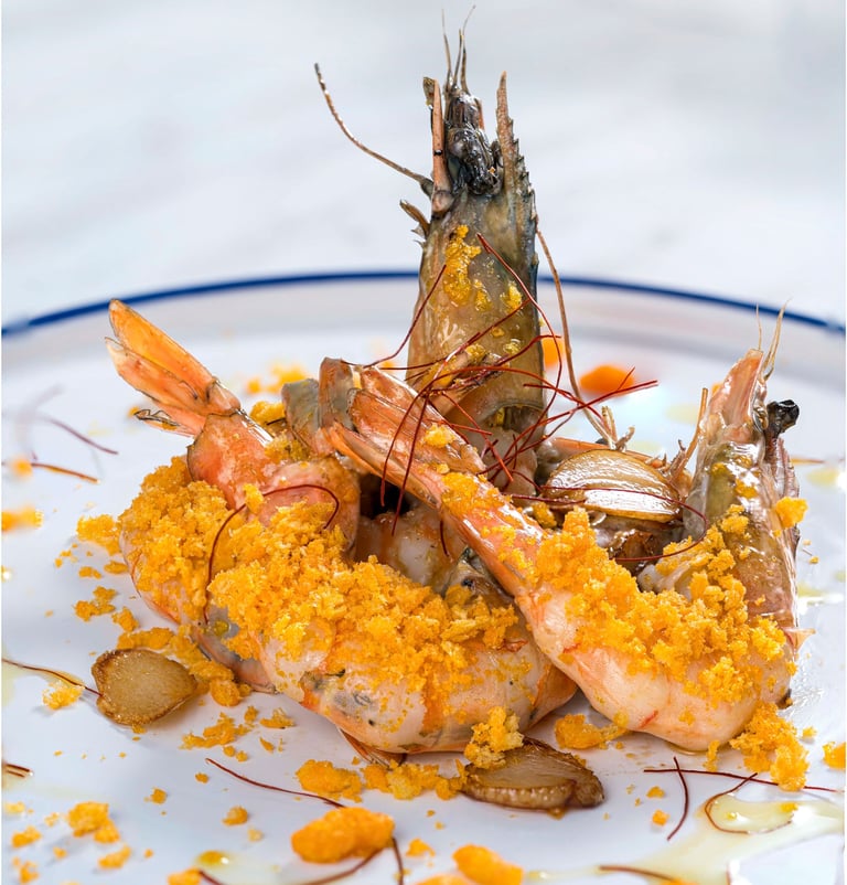 a plate of food with shrimp and shrimp