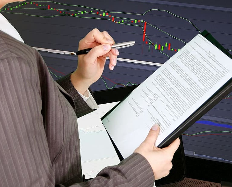 "A consultant analyzing Policy statement on an ipad during a business strategy meeting."