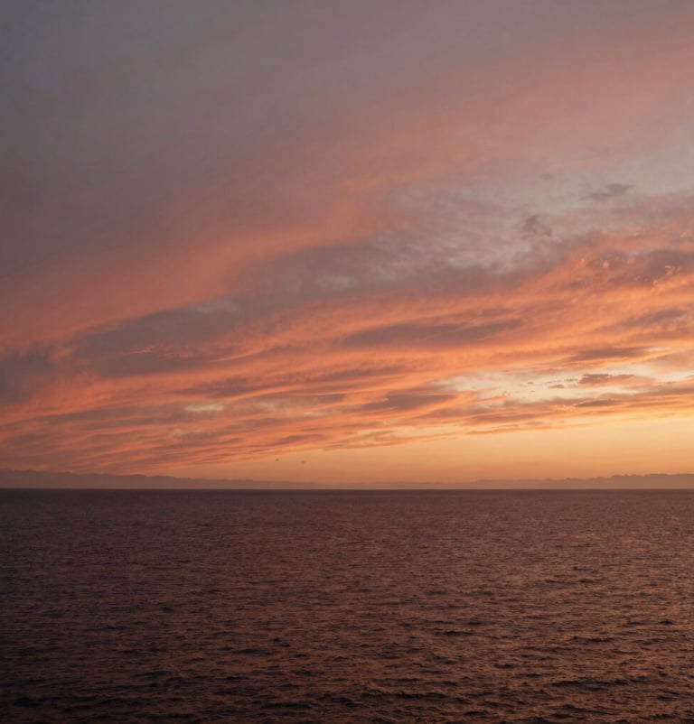 A wide cinematic landscape of a North American / US coast at sunset. The sky is filled with warm Terracotta and Soft Sand hues, evoking a sense of calm and storytelling.