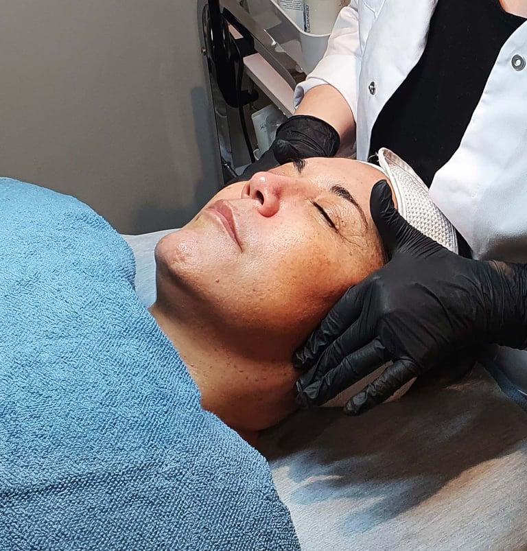 a woman getting a facial lift in a beauty salon with tprx