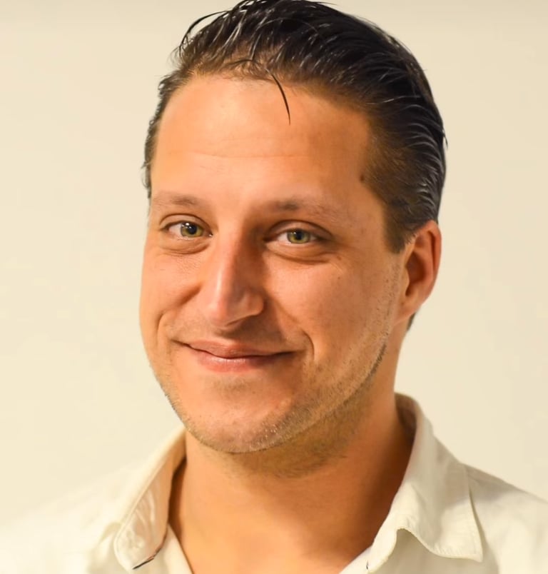 a man with a white shirt and a white shirt