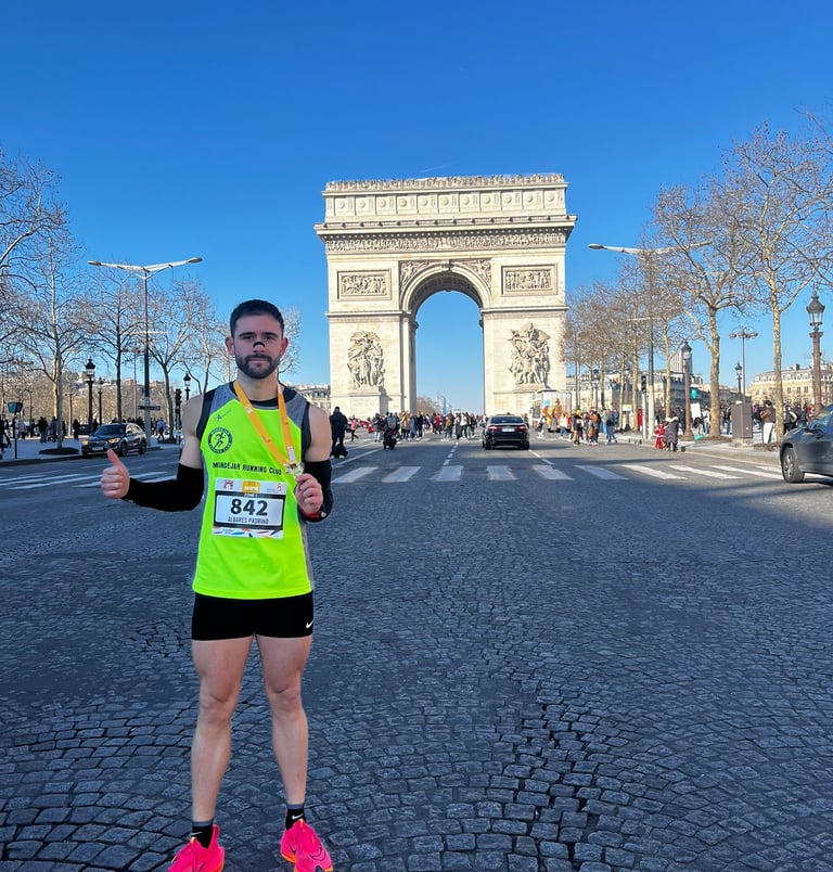 a man in a neon yellow vest and neon green shoes