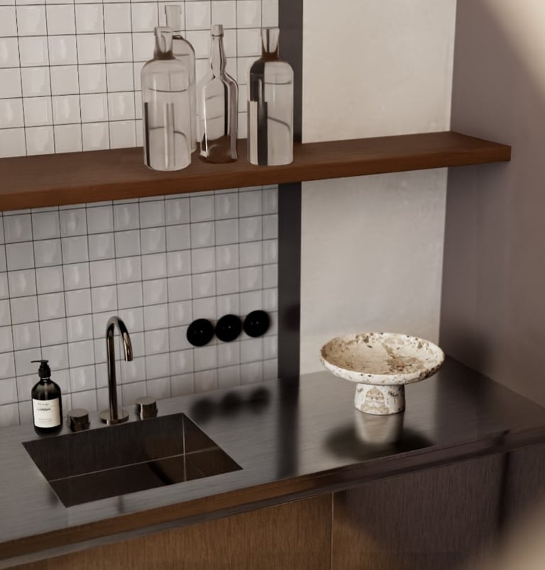Modern sink area with a stainless steel countertop, white tiled backsplash, and a decorative bowl.