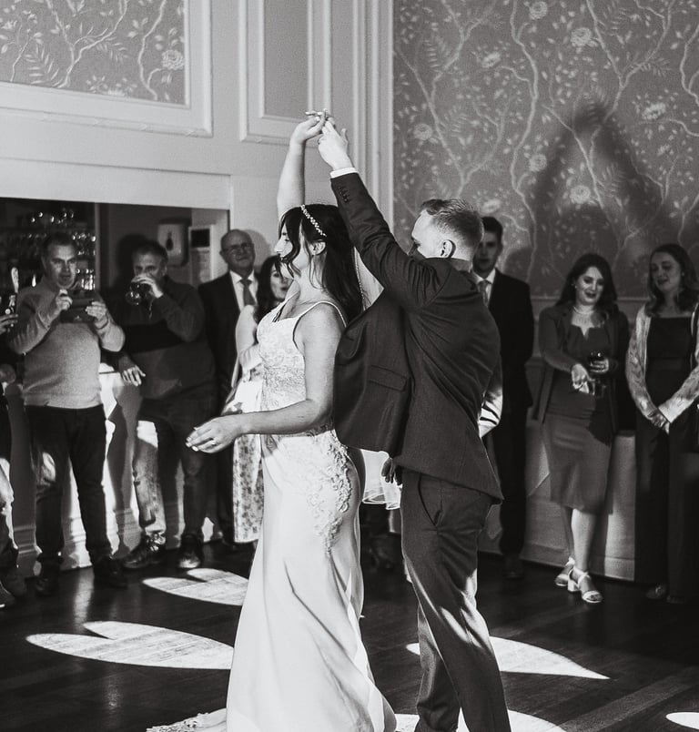 Bride and groom dancing together in Leeds – wedding photography and film by The Wedding Edit