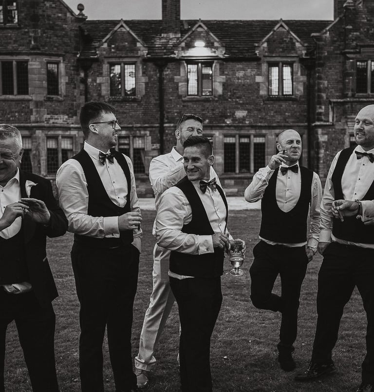 Wedding party celebrating together in Leeds – wedding photography and film by The Wedding Edit