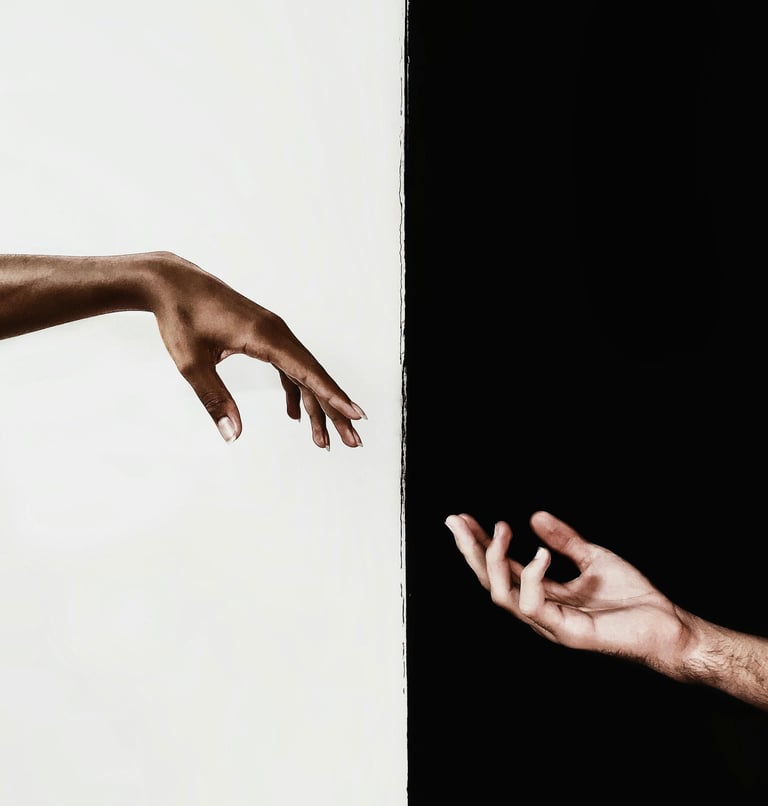 two hands reaching out to each other from opposite directions