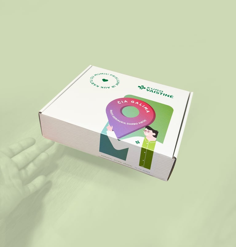 Euro Vaistine branded white cardboard box with colorful pharmacy workplace graphics on a light green background.