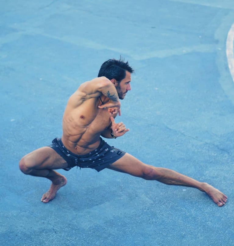 a man is doing a yoga pose from movement snacks online course
