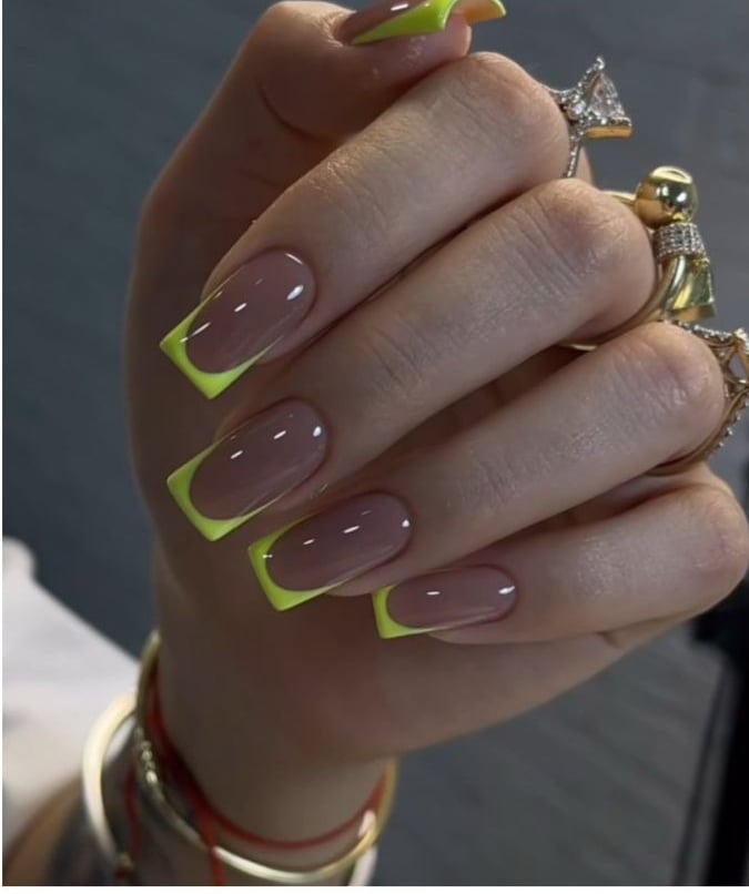 Square shaped French tip nails with a neon yellow micro edge and nude base.