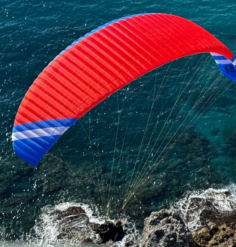  wefly tandem paraglider over sea