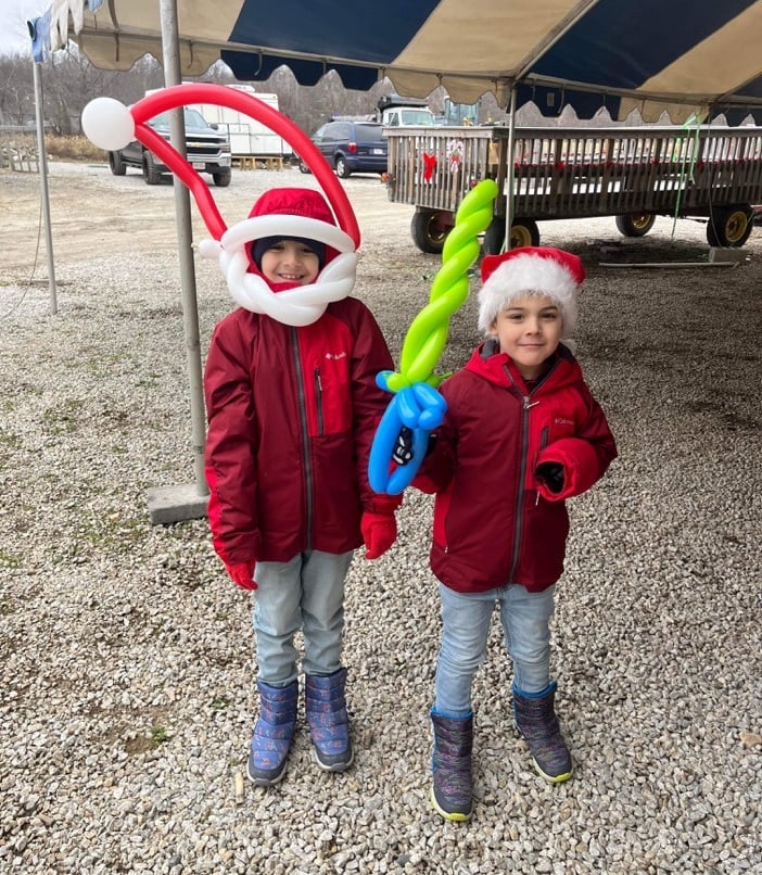 Kids posing with their balloons