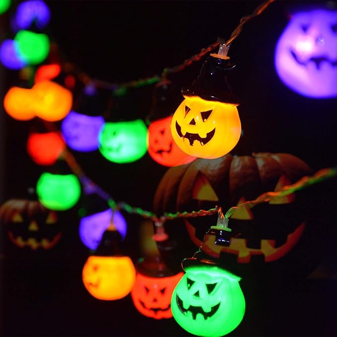 Colorful Halloween string lights shaped like glowing jack-o’-lanterns in orange, green, purple, and 