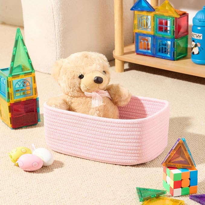 cute pink woven storage baskets.