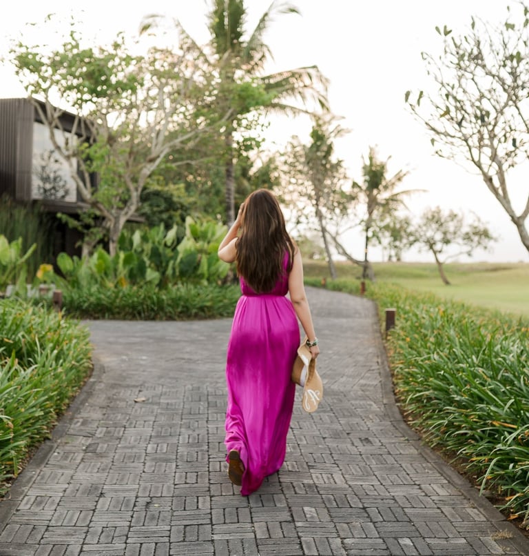 Portrait session walking through resort garden at Alila Soori Tabanan Bali