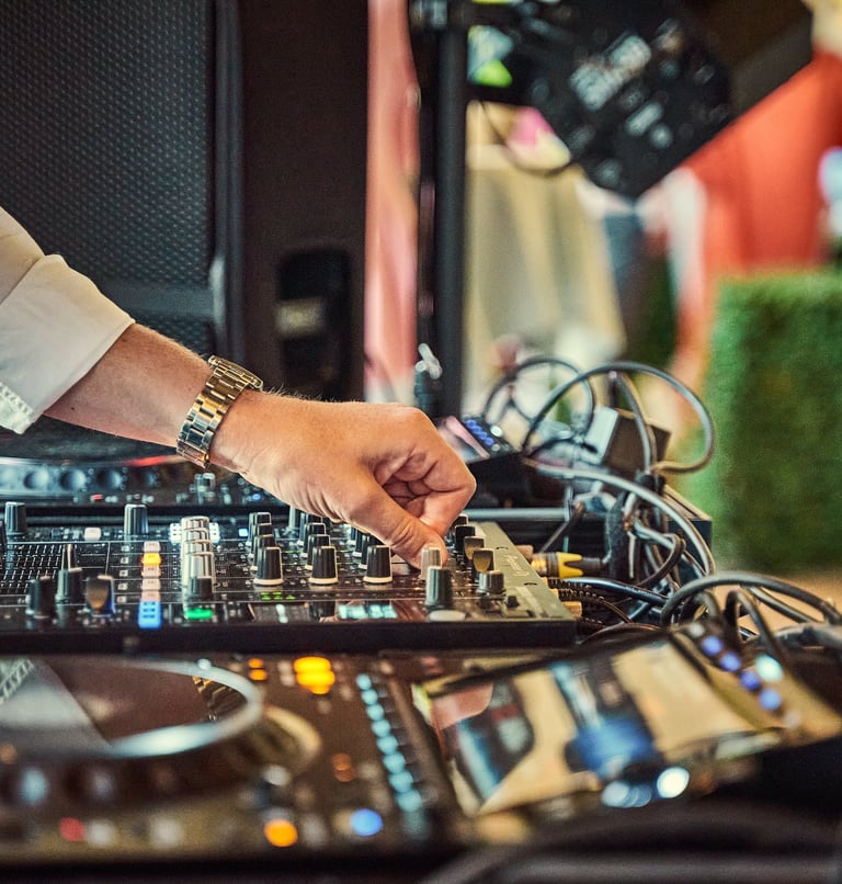 DJ Mixing on decks at drinks reception