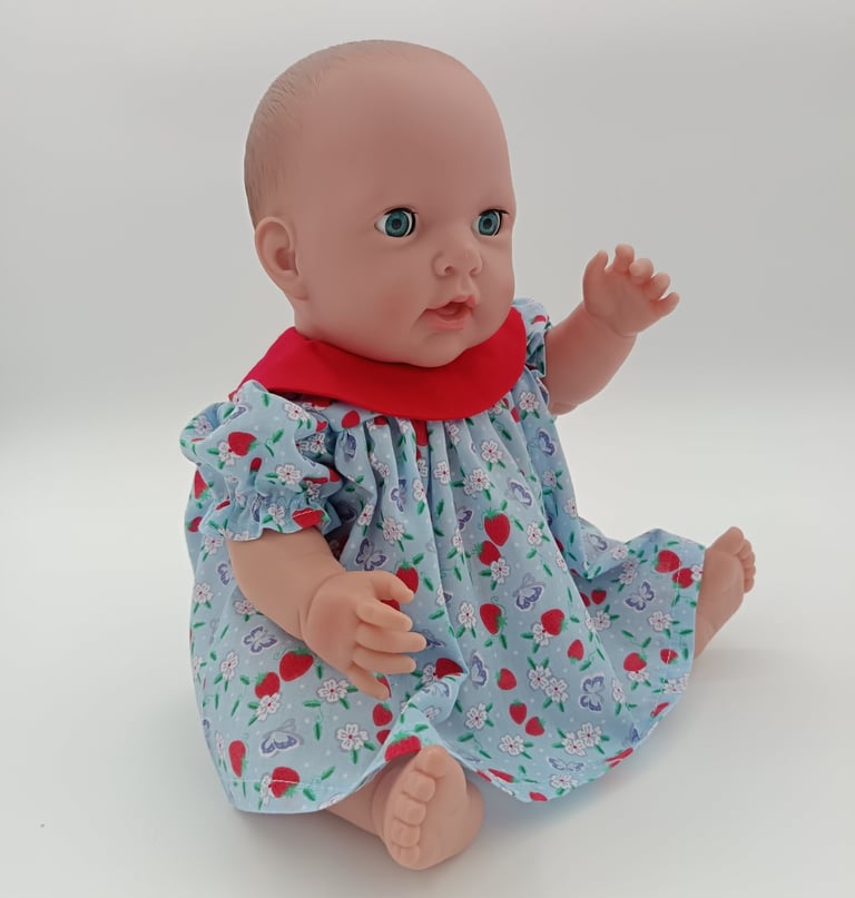 Missy Kissy is blue dress with strawberry print