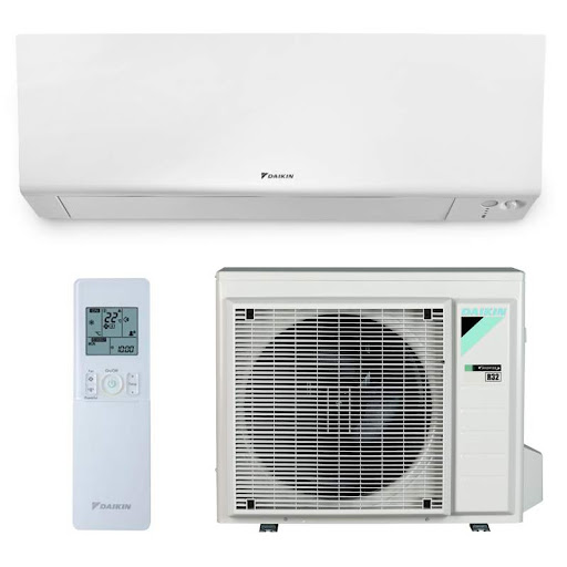a white air conditioner with a remote control