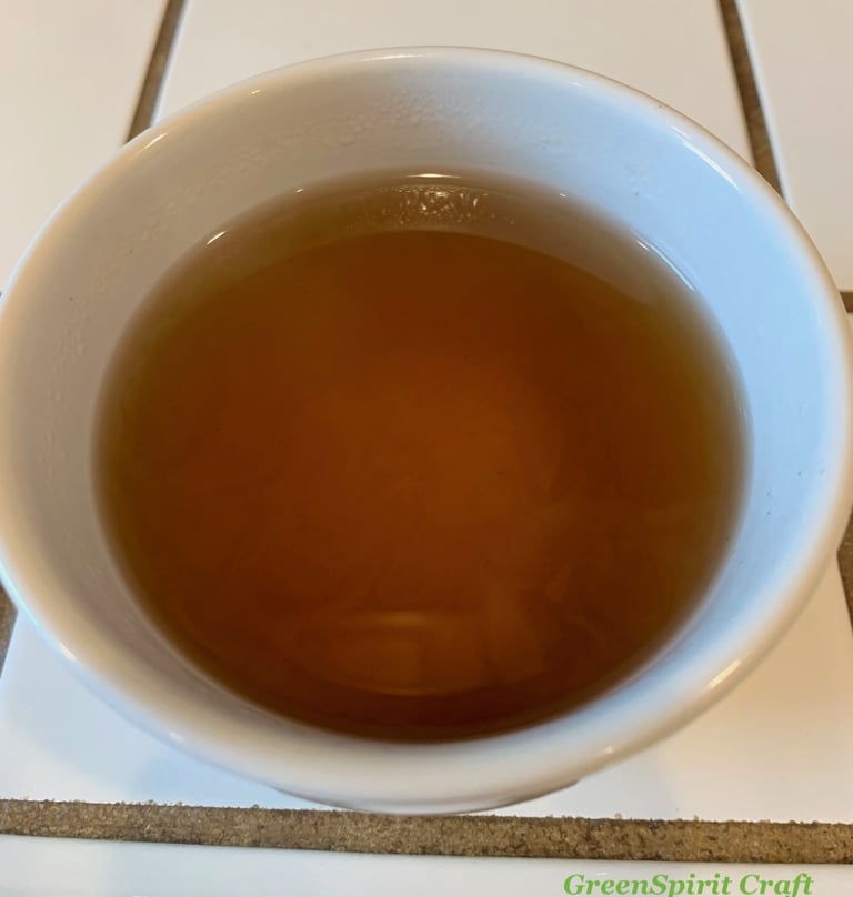 An amber brown infusion of roasted Cleavers seeds