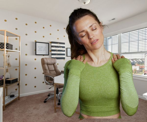a woman in a green top 