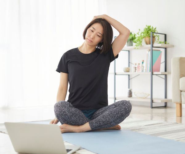 woman doing a neck stretch