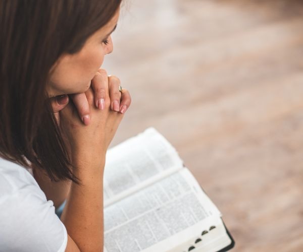 woman reading a bible
