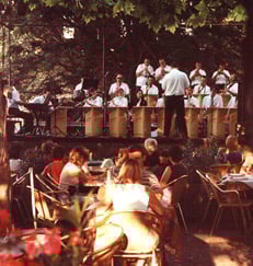 a band playing instruments in a restaurant