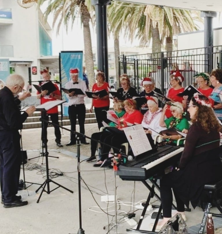The District Singers perform at Cronulla Mall