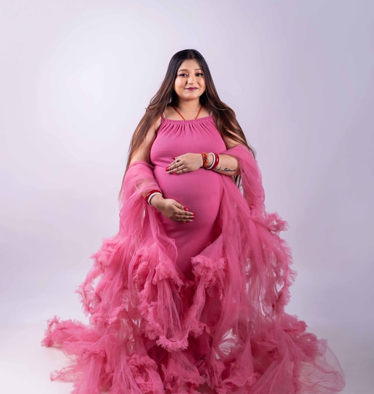 Elegant maternity portrait of an expecting mother at home in Kolkata
