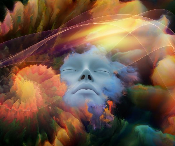 a white mask with a white face and a colorful background