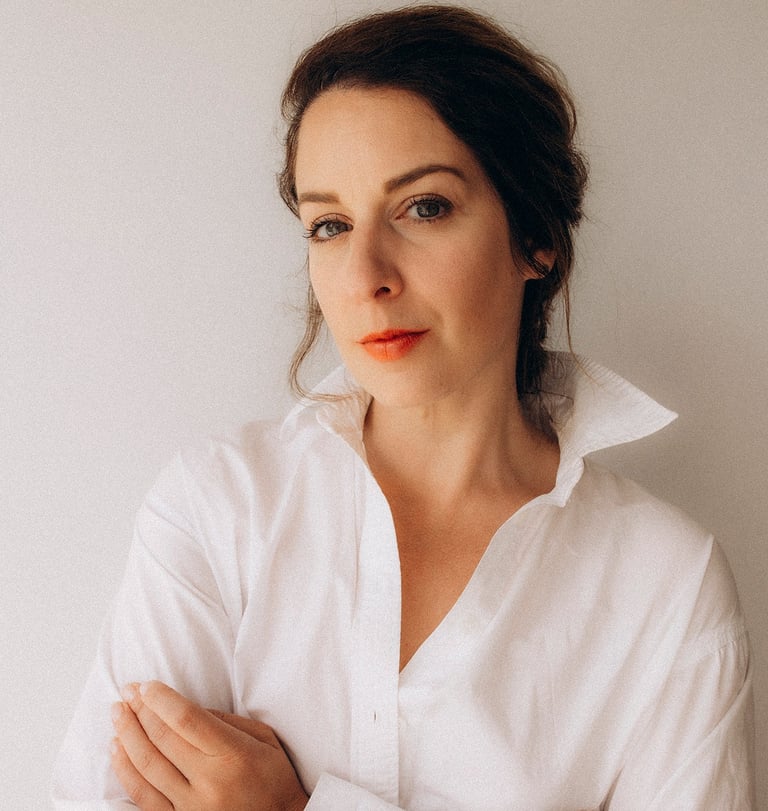 a woman in a white shirt and red lipstick