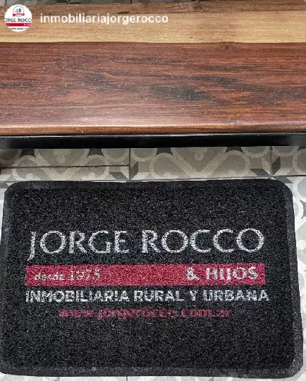 Felpudo personalizado con logo inmobiliaria rocco