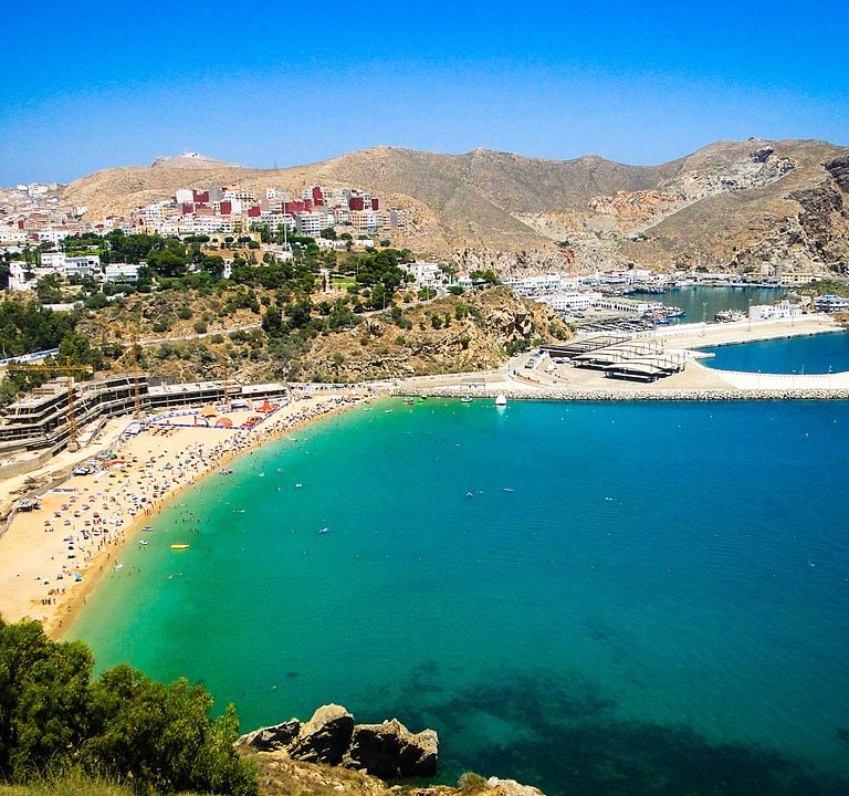 morocco al hoceima a beach with a view of a beach and a mountain
