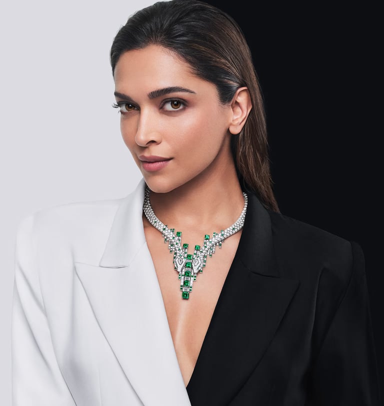 Deepika Padukone wearing Cartier emerald and diamond necklace.