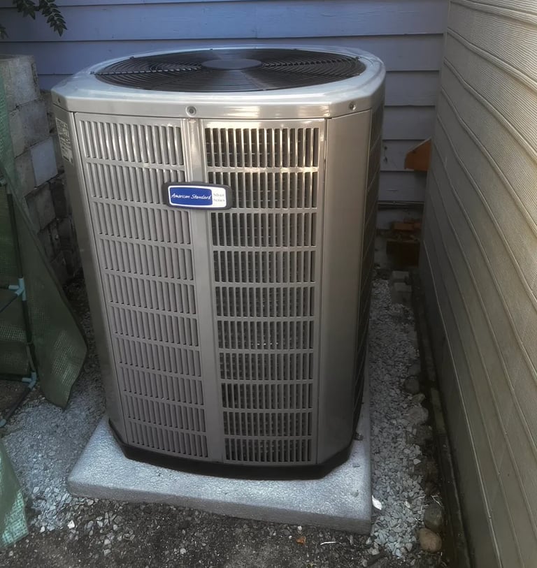 New Heat Pump American Standard installed outdoor nice and tidy area
