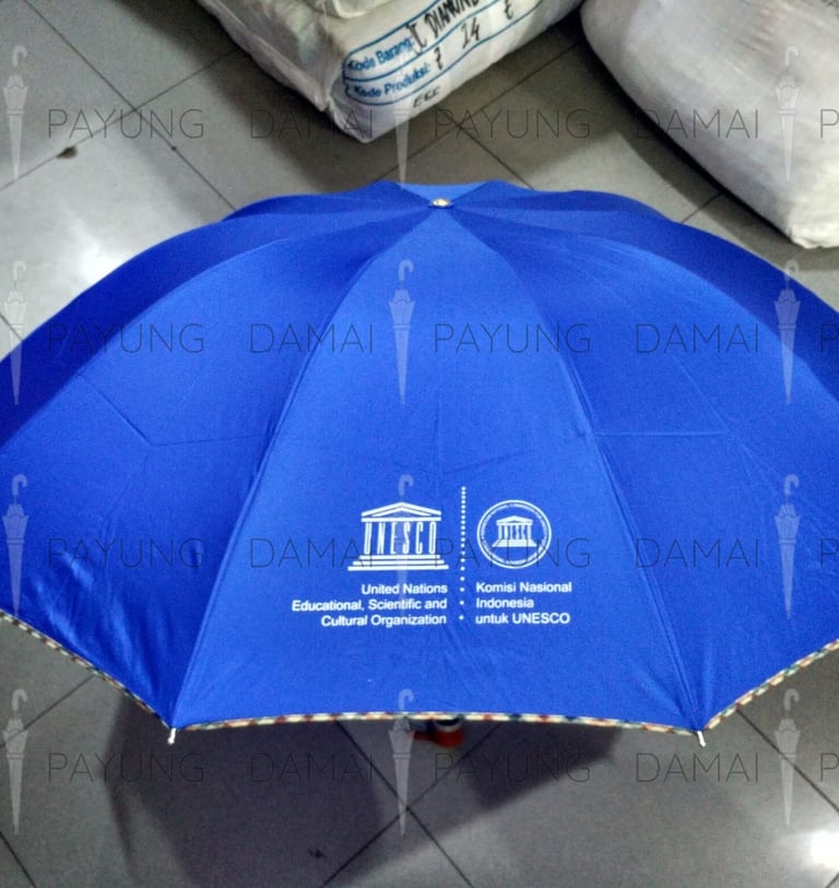 Payung promosi polos lipat super jumbo premium Rosida UNESCO 1