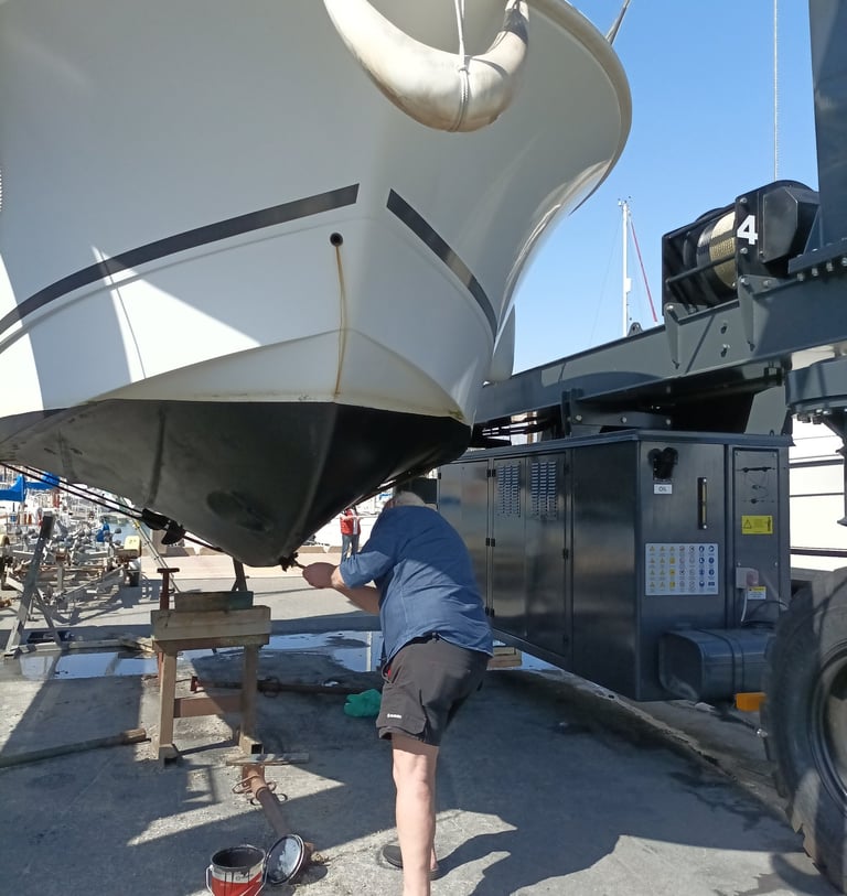 Final touches of anti fouling where the chocks had been