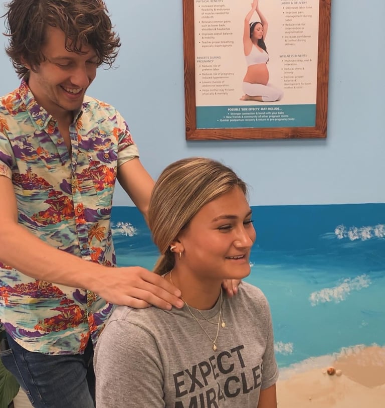 Dr. Spencer performing gentle chiropractic care on child Franklin TN