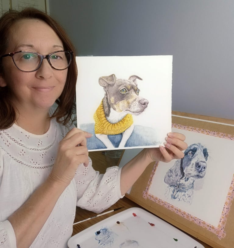 Artist showing pet portrait artworks