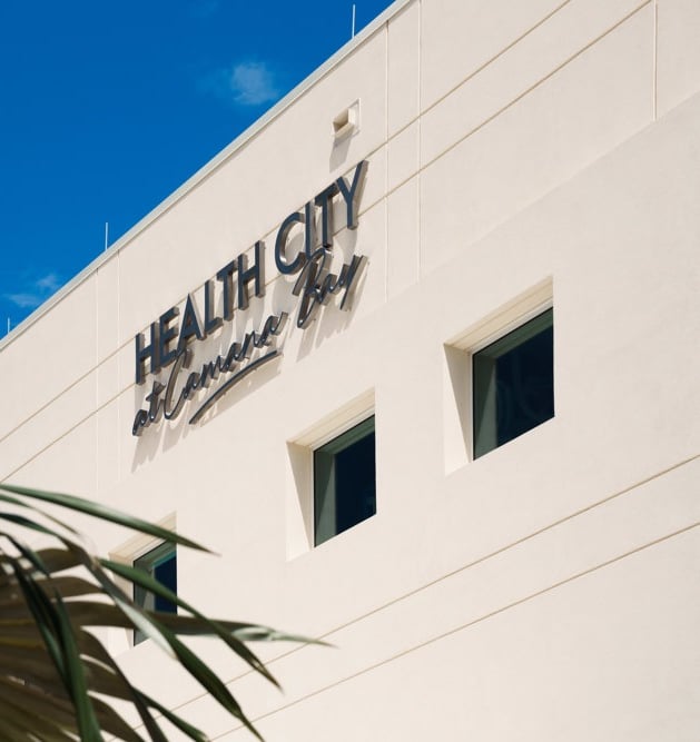 Health City Hospital, Cayman—modern state-of-the-art medical facility exterior with adv achitecture