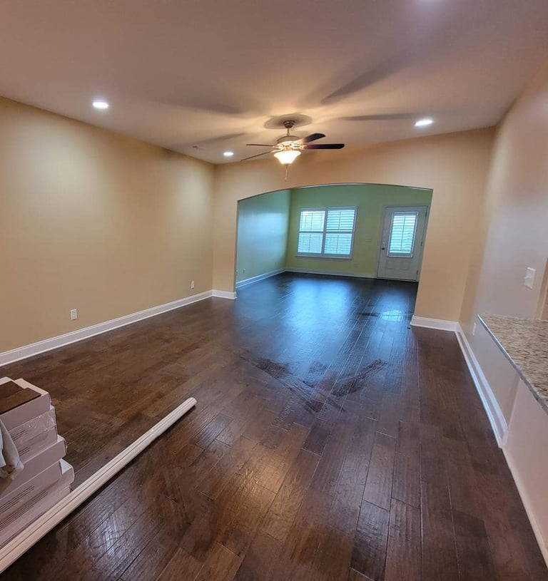 a room with a painting a flooring