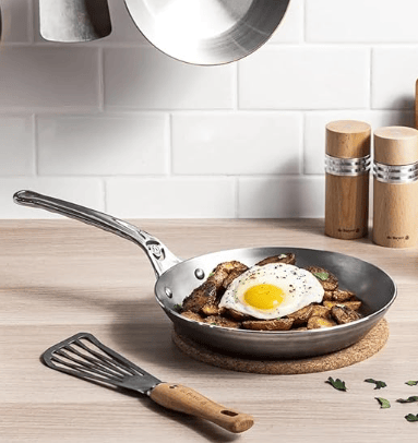 de Buyer Mineral B Pro 11-inch carbon steel fry pan with stainless steel handle and beeswax finish.